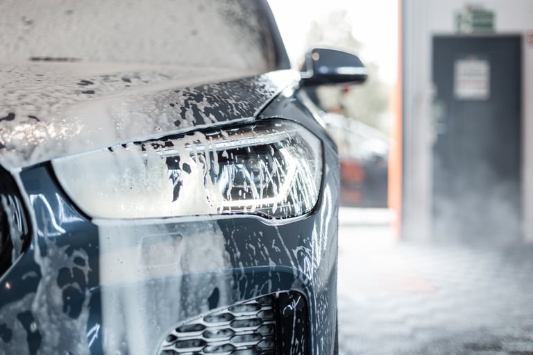 Car with foam at car wash