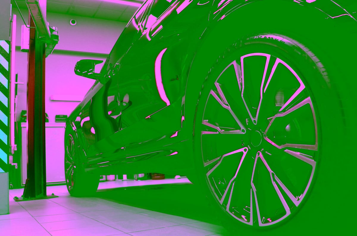 Black SUV detailed at service station